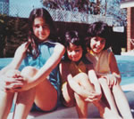 at 12, with her younger sisters